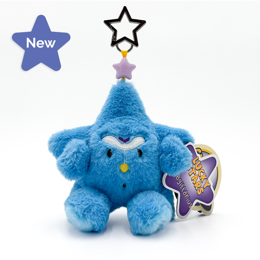 A blue plush star-shaped Keychain with a pointed hat, small embroidered facial features, and a hanging tag that reads 'Lucky Stars Sagittarius', photographed on a clean white background.